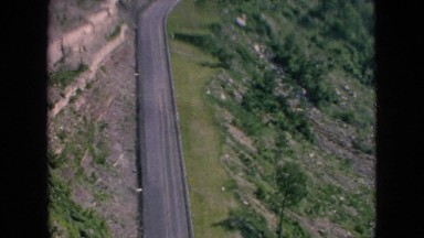 1964: empty road going up in the mountain shown during the day NIAGRA FALLS