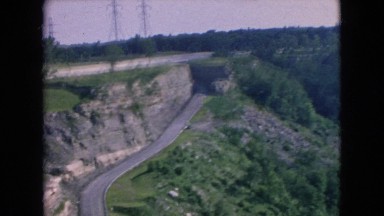 1964: road in between hilly greenery area NIAGRA FALLS NEW YORK