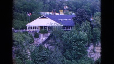 1964: scenic place with forest, resorts, waterfall, bridges etc NIAGRA FALLS