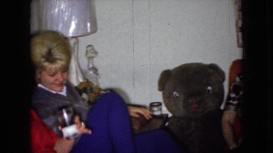 1965: old school cool video of friends enjoying a few drinks with shaggy dog