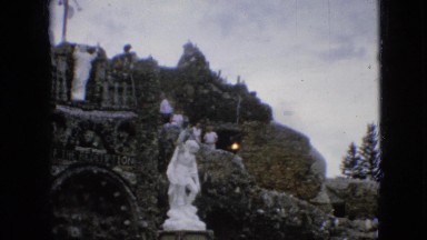 1967: visitors touring a nice statue. IOWA
