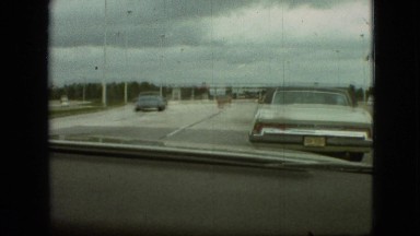 1968: driving down the highway on a cloudy day MISSOURI