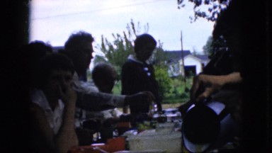 1969: people gather for a picnic outside. CALIFORNIA