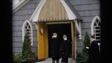 1957: various people entering through the doors of a church PENNSYLVANIA