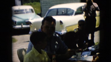 1957: gathering outdoors near cars PENNSYLVANIA