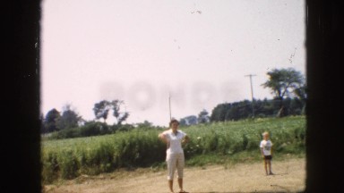 1957: parents playing with the kids outdoor
