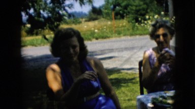 1957: family outside enjoying each other's company. PENNSYLVANIA