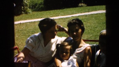 1957: family on a swing bench outside PENNSYLVANIA
