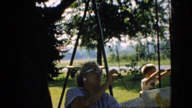 1957: child having good time with granny in the park. PENNSYLVANIA