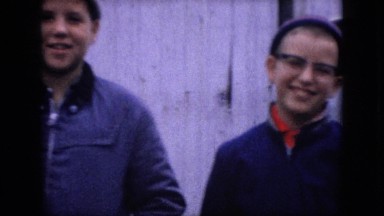 1964: Happy Smiling Young and Older Boys During Winter Wearing Beanies