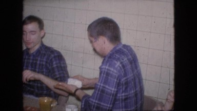 1964: happy family celebrating birthday of the bald father. PHILADELPHIA