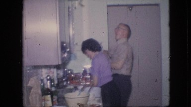 1964: washing, talking, water, soap, laughing, helping, man, woman, dish