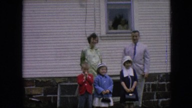1964: a family posing outside in front of the house PHILADELPHIA PENNSYLVANIA