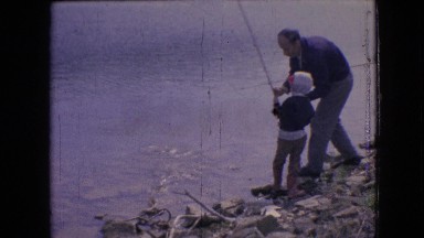 1964: father with kid teaching fishing outdoor activity PHILADELPHIA