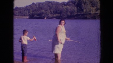 1964: bunny mother and funny children fishing in the water PHILADELPHIA