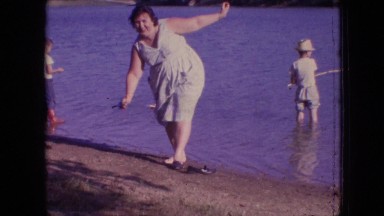 1964: family fishing on vacation at lake PHILADELPHIA PENNSYLVANIA