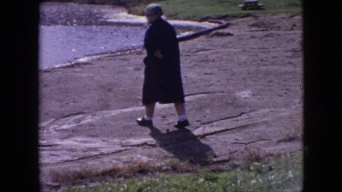 1964: woman walking natural setting cold outdoors PHILADELPHIA PENNSYLVANIA