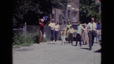 1965: dozens of people gathered in the street in an urban setting NEW JERSEY