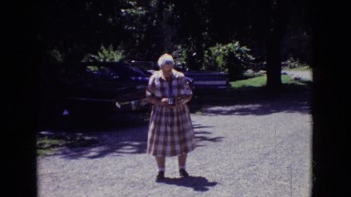 1965: woman standing in the driveway. NEW JERSEY