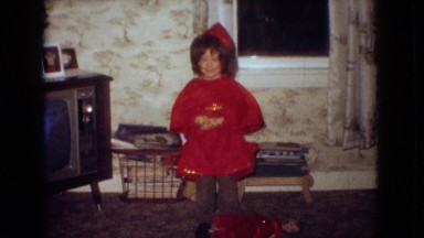 1965: little girl in red costume practices for performance NEW JERSEY