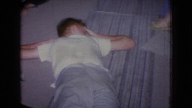 1965: footage of family sitting together in living room NEW JERSEY