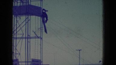 1965: horse jumping into water from a tower, people at sea shore NEW JERSEY