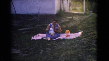1965: bunny mom sitting with her little lad on the ground NEW JERSEY