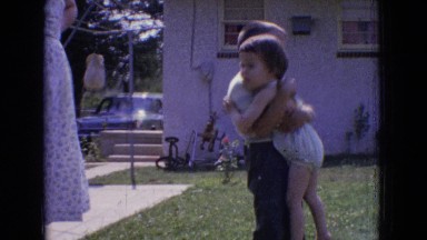 1965: family hanging out in the yard at home. NEW JERSEY