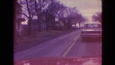 1966: a white car is being chased by a red car along the avenue ATHENS OHIO
