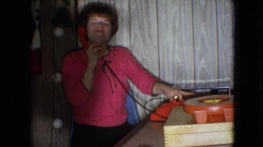 1966: woman speaking over phone conversing pink ATHENS OHIO