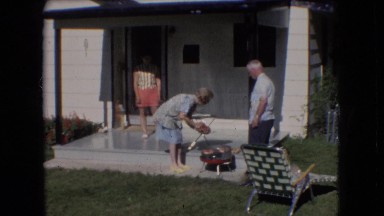 1966: little baby crawling in the grass. ATHENS OHIO
