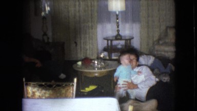 1966: children playing indoor with father lying down ATHENS OHIO