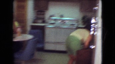 1966: home indoor scene woman searching in kitchen area ATHENS OHIO