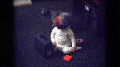 1966: dog and little kids playing in the living room floor. ATHENS OHIO