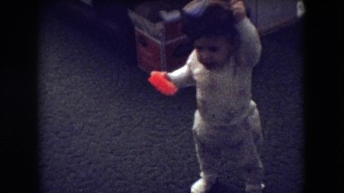 1966: home video of a cute baby putting on a hat and falling down ATHENS OHIO