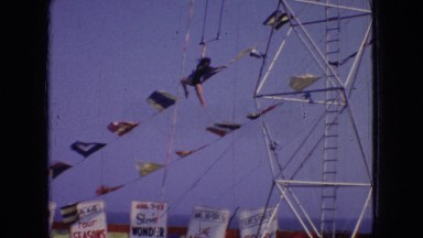 1966: trapeze woman performing on windy day NEW JERSEY
