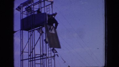 1966: a kid practicing for a horse jump into water from heights. NEW JERSEY