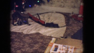 1966: children playing with toy train in the room with many toys NEW JERSEY