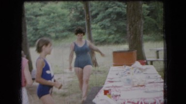 1966: family and friends cleaning up from a picnic in the mountains OHIO