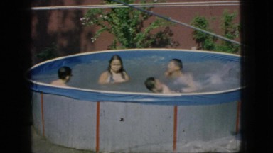 1966: family enjoying time in a swimming pool. NEW JERSEY
