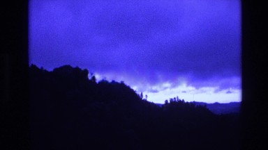 1974: unique place rocky terrain serene and calm clouds