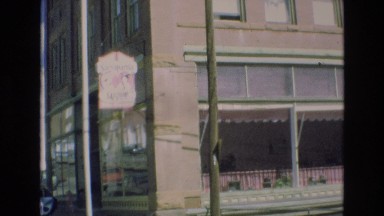 1969: landmark people standing road cars moving