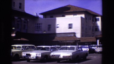 1967: many vehicles parked beside a large spectacular building COLORADO SPRINGS