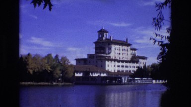 1967: tranquil view of house across a calm lake COLORADO SPRINGS BROADMOR