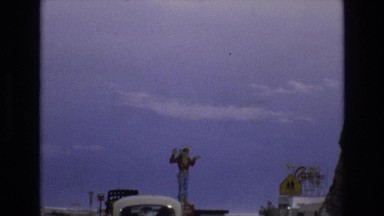 1965: tall man sign LAKE TAHOE NEVADA
