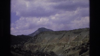 1965: a beautiful mountain ridge as seen from a moving vehicle LAKE TAHOE NEVADA