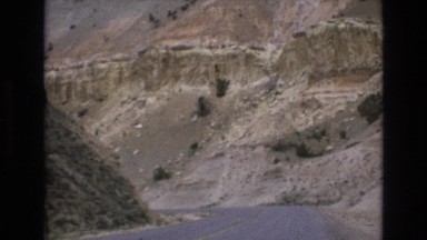 1965: Driving Down a Winding Road Through a Canyon in Lake Tahoe, Nevada