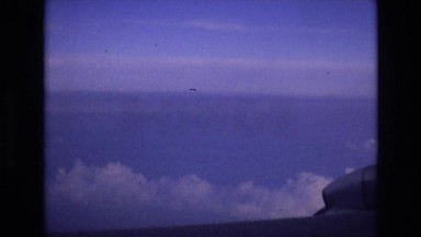 1969: Wings of an Aircraft Travelling High Above Spain