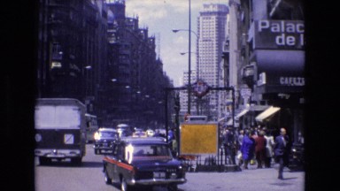 1969: Vehicles Traveling on a Busy Street in Spain