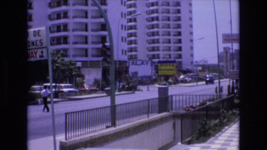 1969: a woman walking done into what appears to be a subway station SPAIN